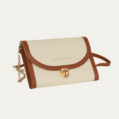 Women's brown and cream travel clutch